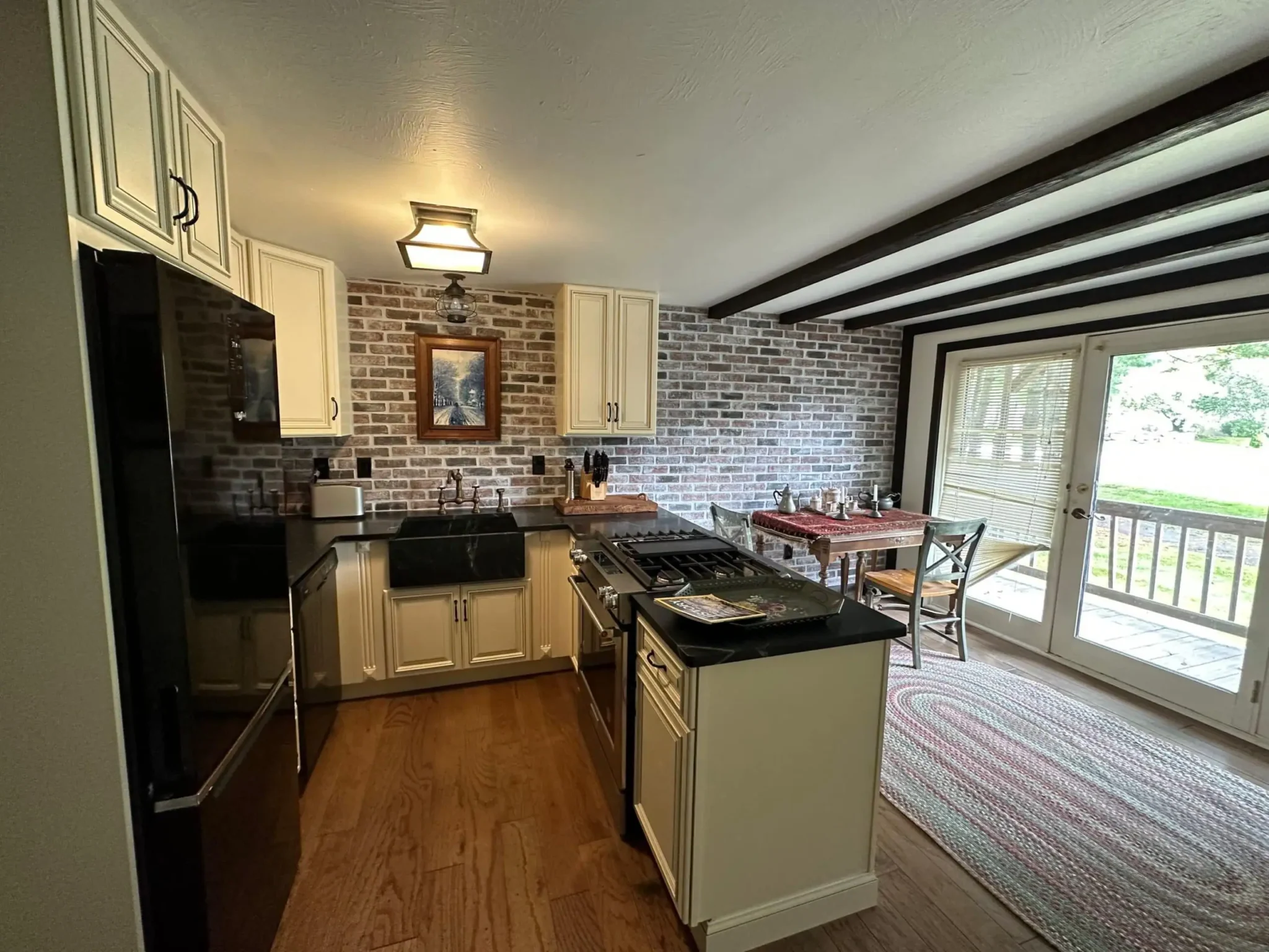 Rustic Traditional Kitchen Remodel by All Work Construction, Inc. project photo