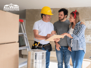 Contractor reviewing a bathroom remodel change order with a homeowner
