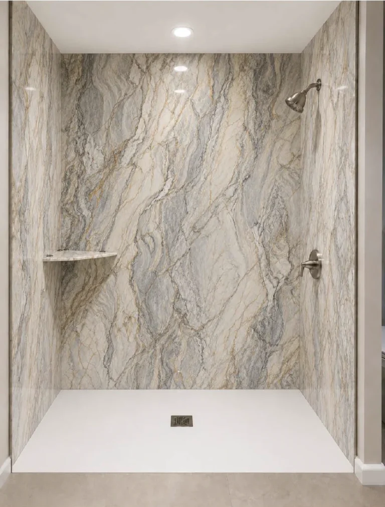 Modern walk-in shower featuring Marina Caldera porcelain slabs with dramatic gray, beige, and gold marble-like veining, a white shower base, and brushed nickel fixtures