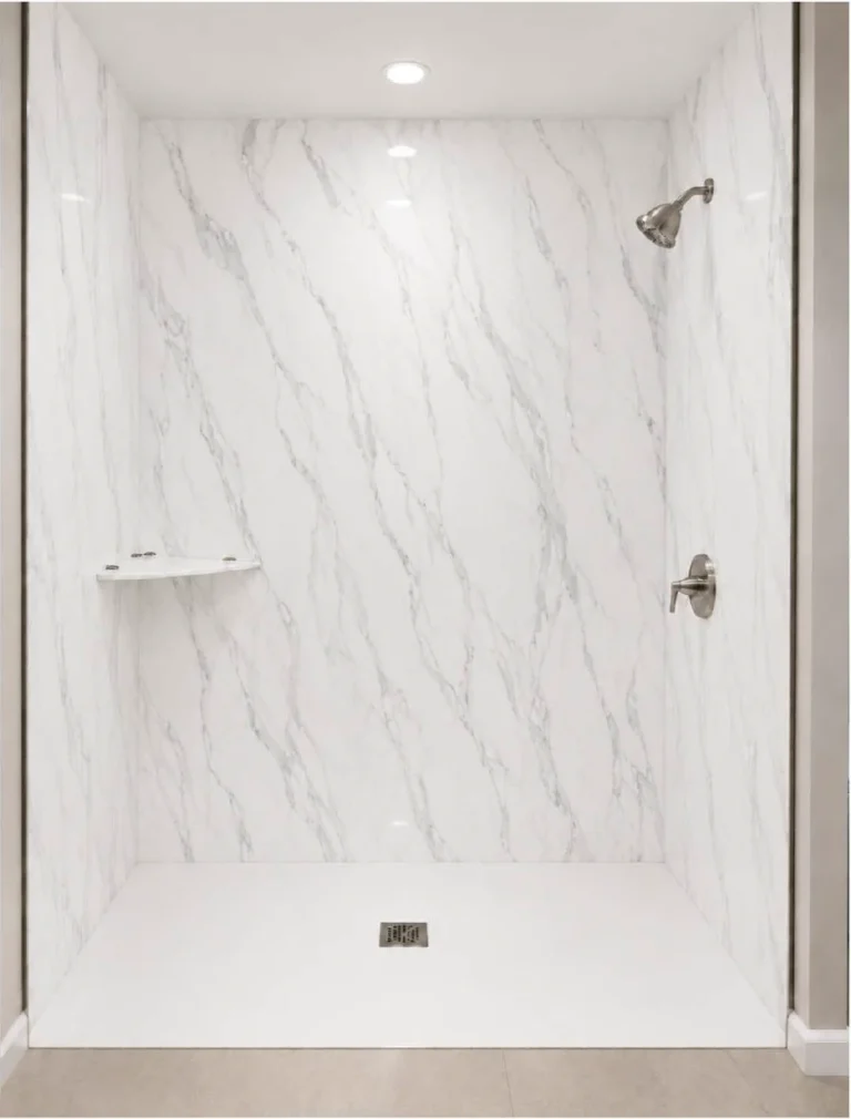 Modern walk-in shower featuring Statuario Blue porcelain slabs with a white marble-look finish, delicate blue-gray veining, and sleek chrome fixtures